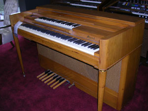 Starck Organo used spinet piano